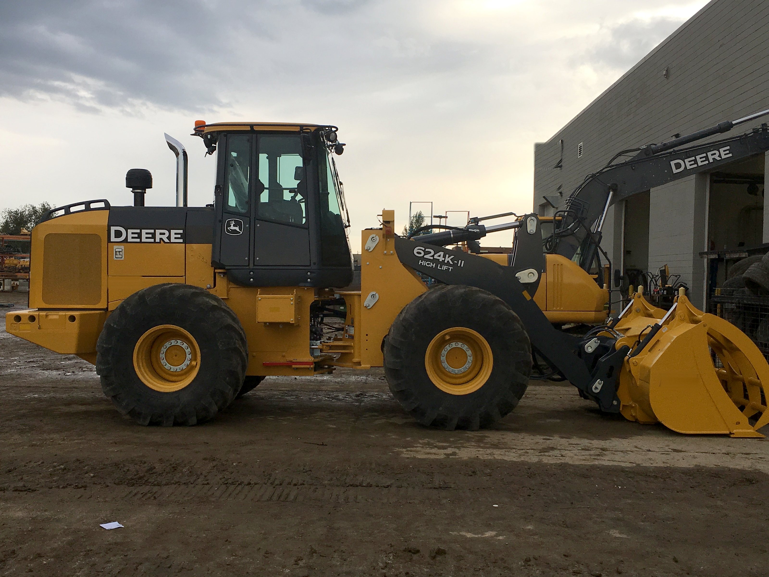 The group's John Deere 624K wheel loader at the shop