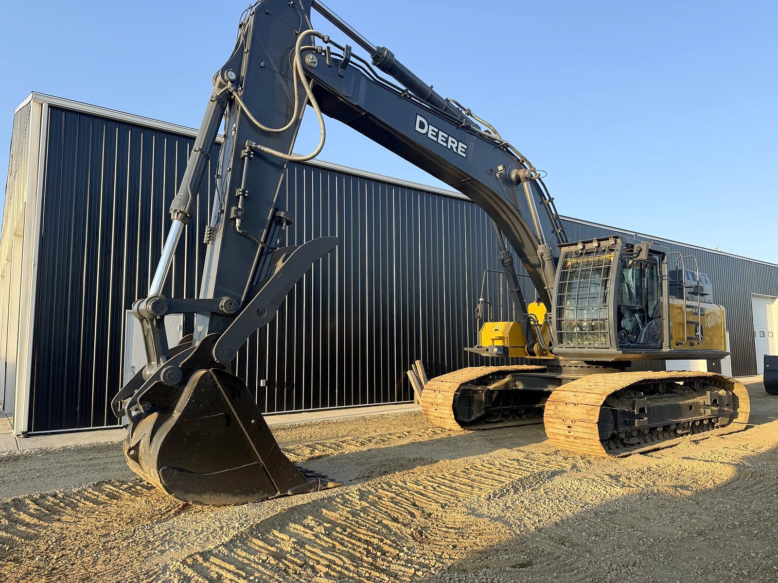The group's John Deere 470G LC excavator at its shop