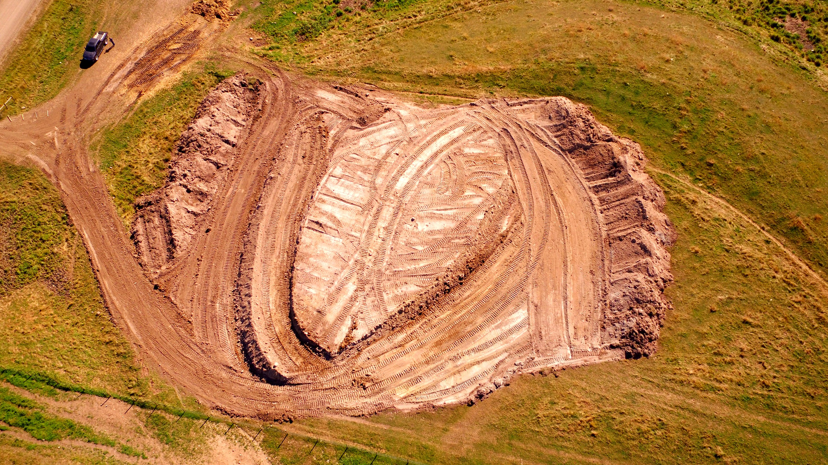 Cutting a borrow pit on the group's own land, from Overwatch