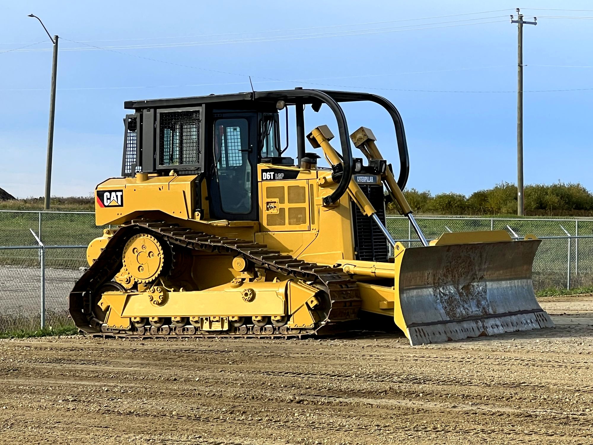 Caterpillar D6T LGP crawler dozer, owned fleet — the STE-KIT-010 host machine